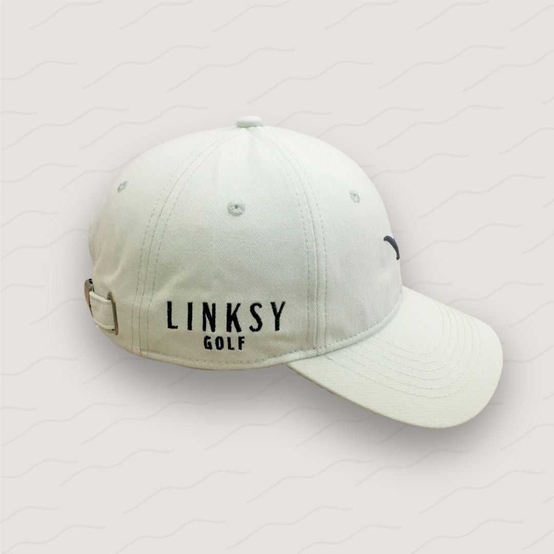Little Birdie golf cap with Linksy Golf branding and an adjustable strap for a custom fit.